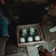 Vodka being lowered into spooky cellar